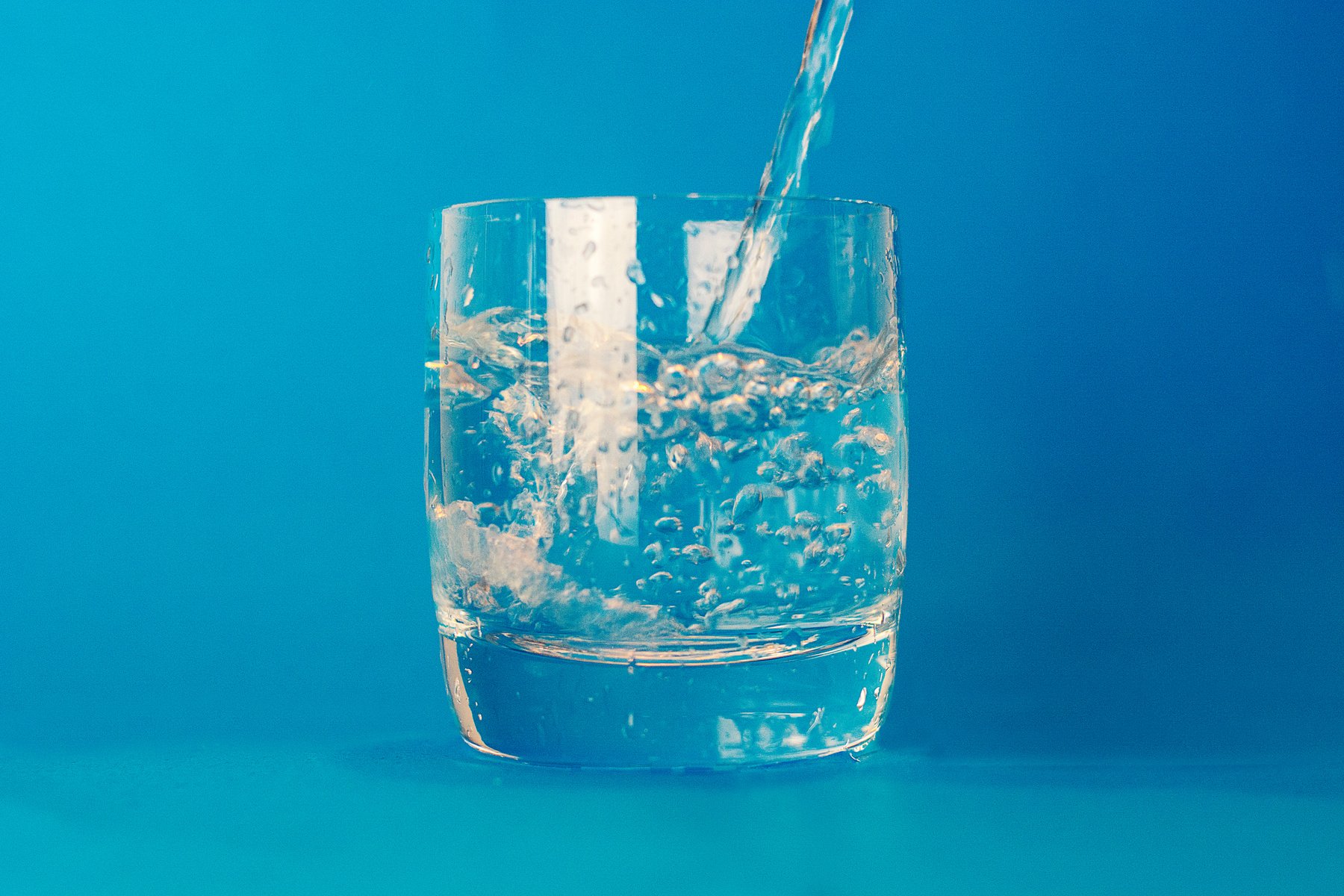 Clear Drinking Glass With Water Poured in